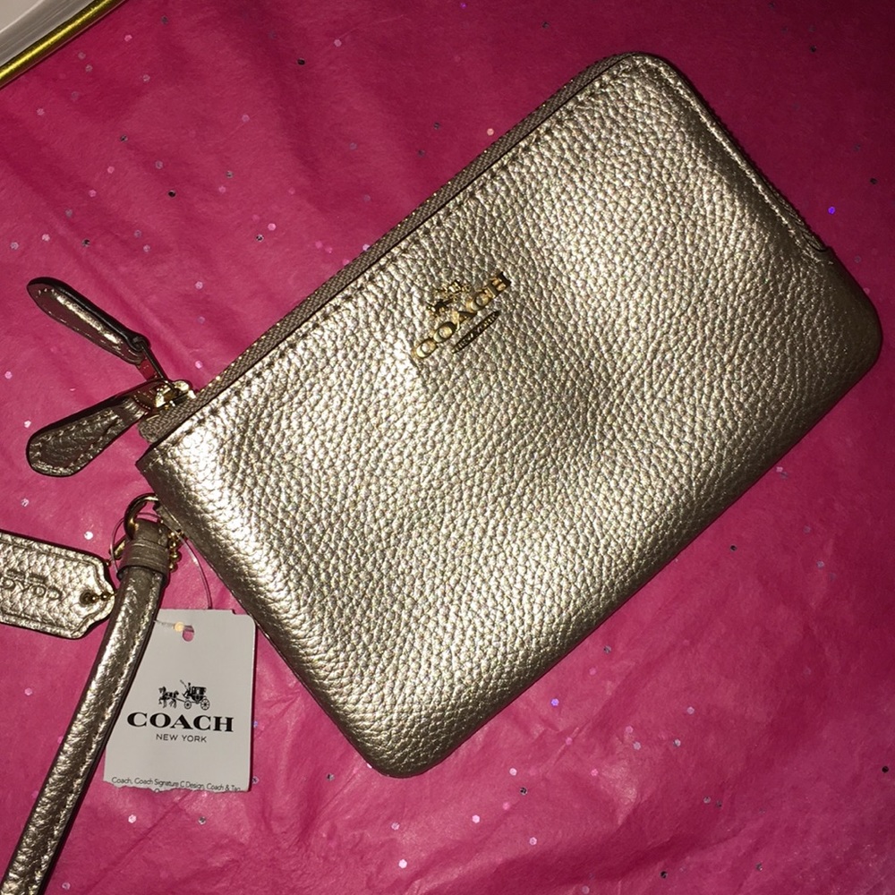 Hard to find and beautiful gold Coach wristlet NEW